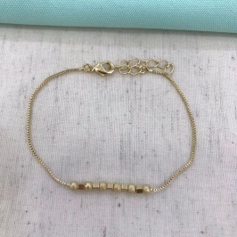 PULSEIRA SQUAD ESFERA FOSCA BANHADO A OURO