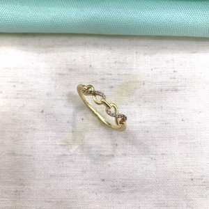 ANEL INFINITO EM ZIRCÔNIA BANHADO A OURO