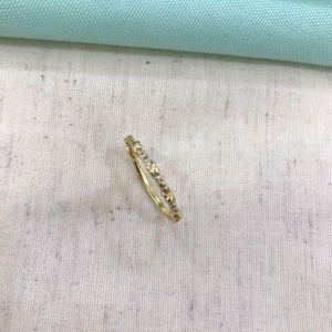 APARADOR FINO ZIRCÔNIA BANHADO A OURO