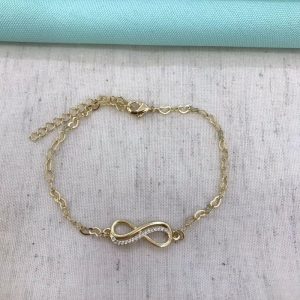 PULSEIRA INFINITO ZIRCÔNIA BANHADO A OURO
