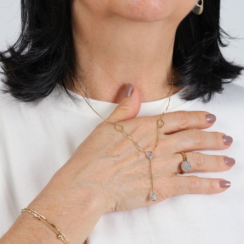 GRAVATINHA GOTAS EM ZIRCÔNIA BANHADO A OURO