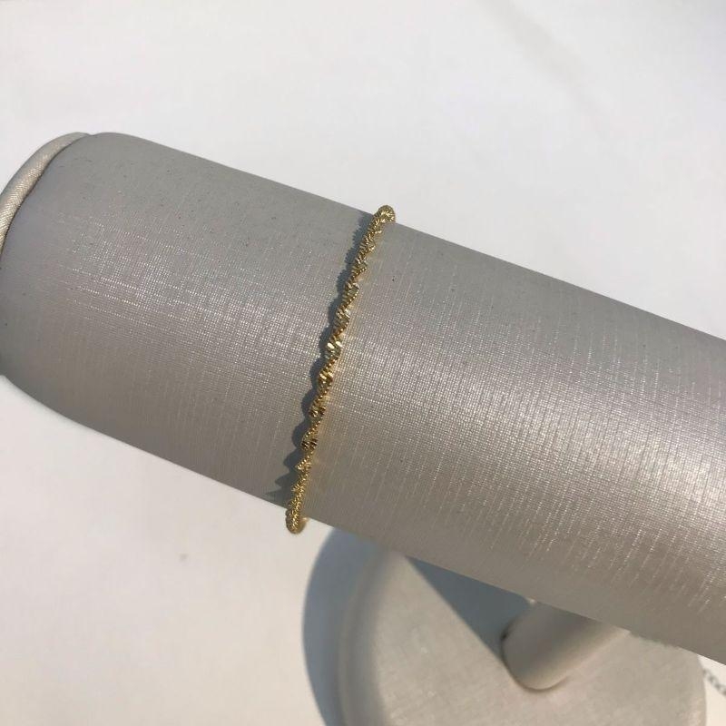 PULSEIRA CORRENTARIA TORCIDA BANHADO A OURO