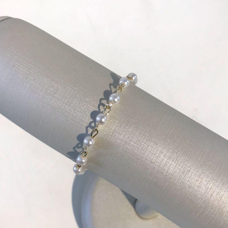 PULSEIRA PÉROLA DETALHES BANHADO A OURO