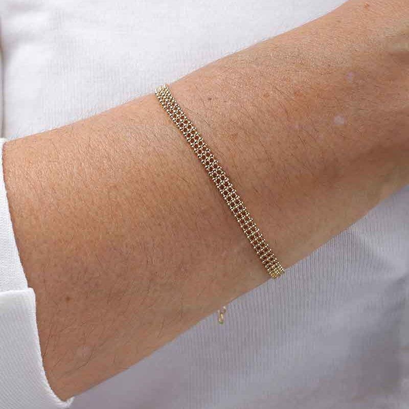 PULSEIRA MALHA ESFERA BANHADO A OURO