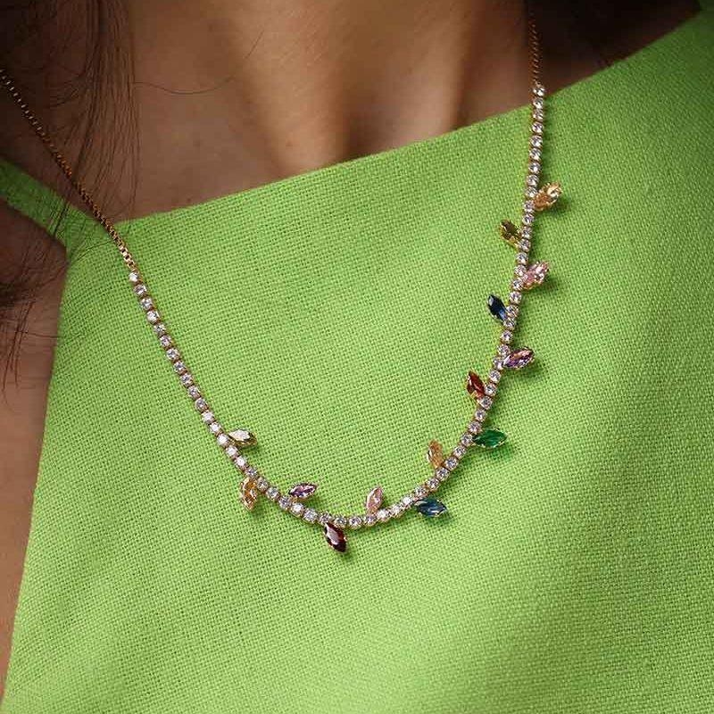 RIVIERA FOLHAS CRAVEJADO EM ZIRCÔNIA COLORIDA BANHADO A OURO