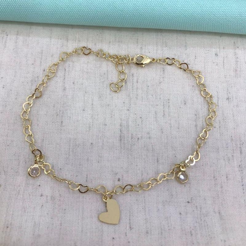 PULSEIRA CORAÇÃO VAZADO PONTO DE LUZ BANHADO A OURO