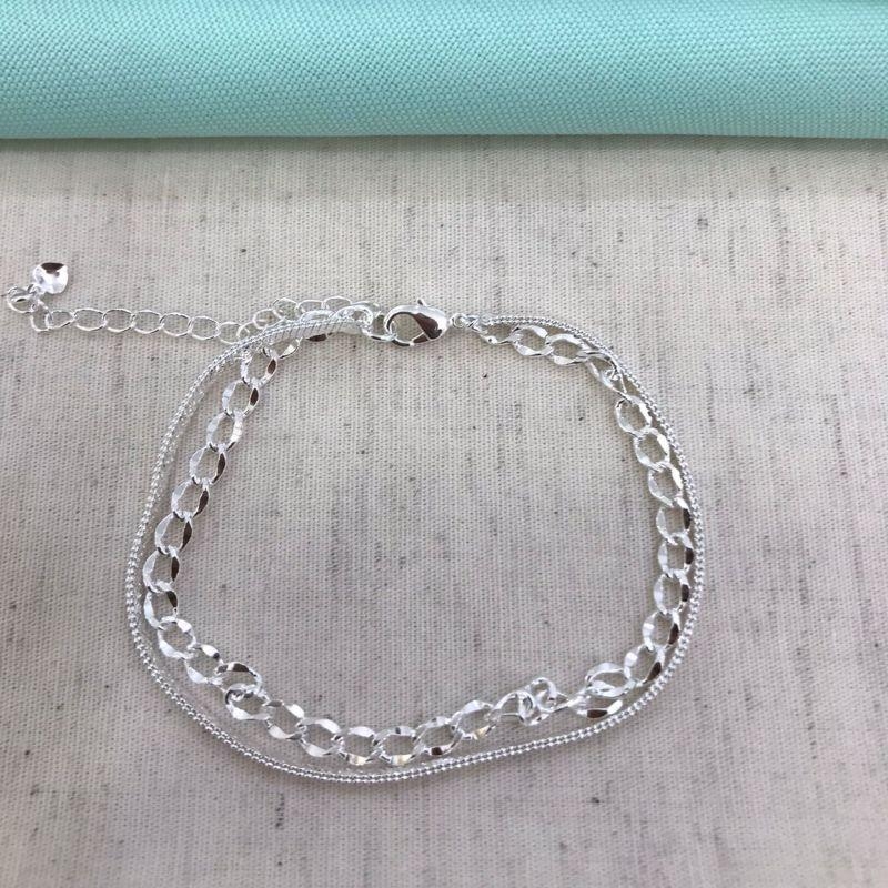 PULSEIRA DUPLA ENTRELAÇOS BANHADO A PRATA