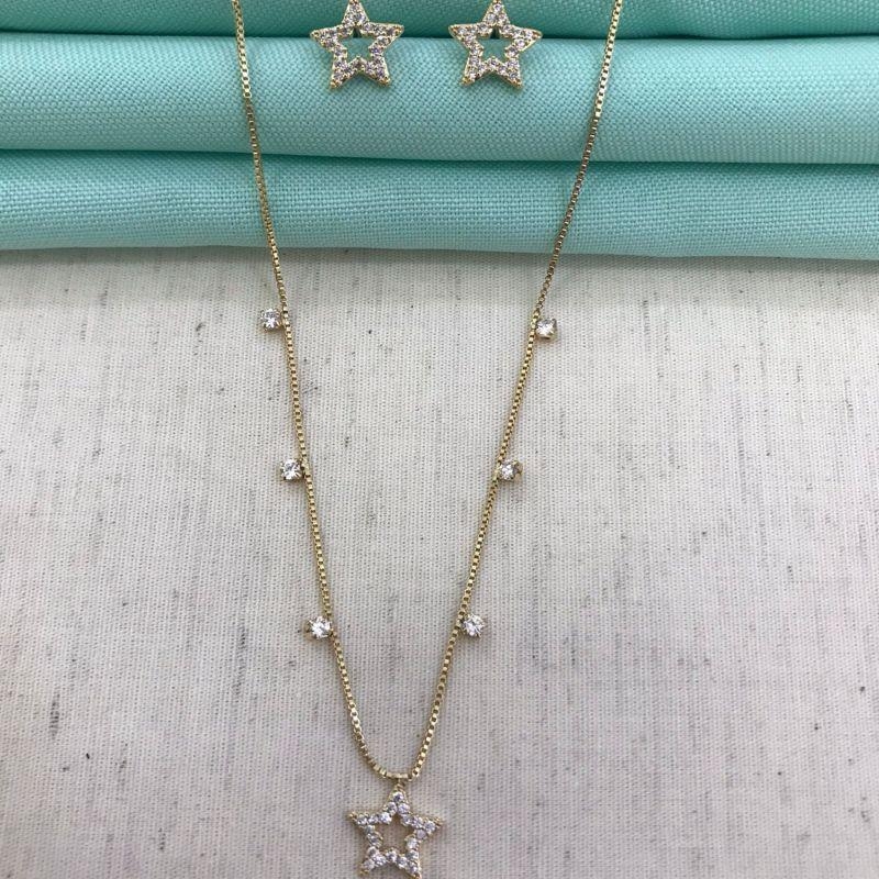 BRINCO DE ESTRELA VAZADO EM ZIRCÔNIA BANHADO A OURO