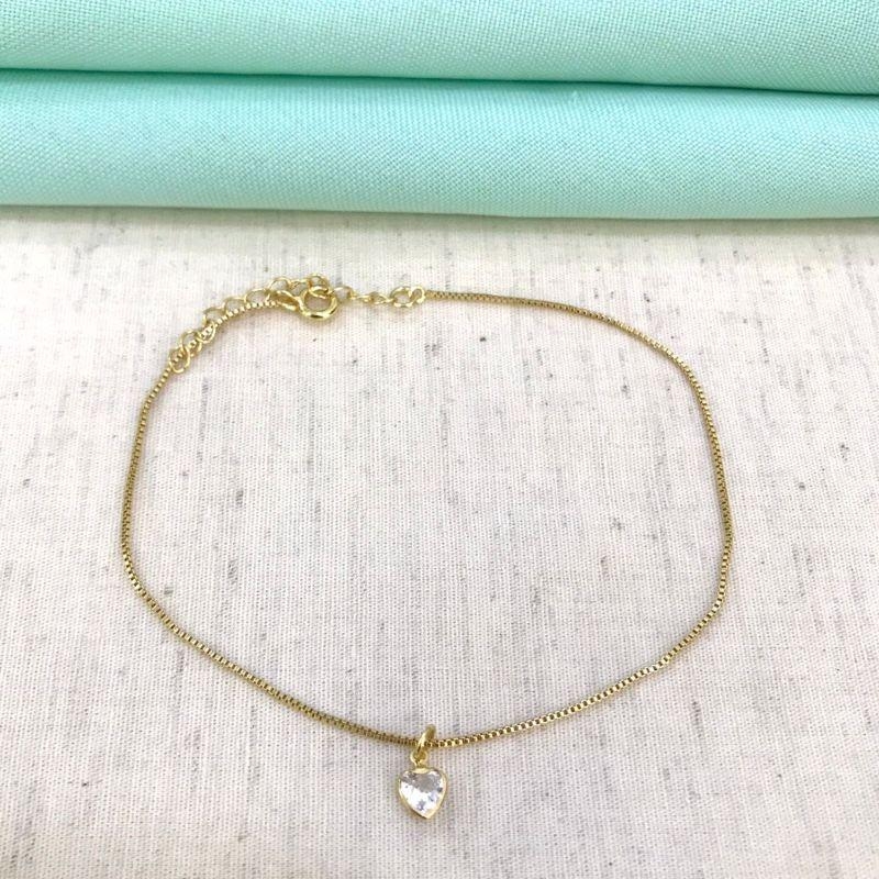 TORNOZELEIRA NIRA BANHADO A OURO