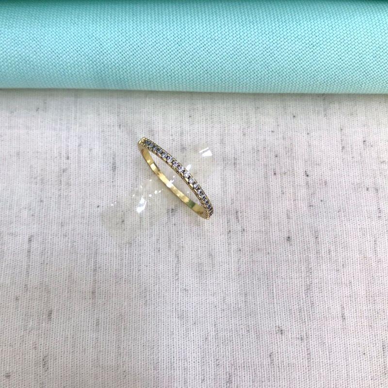 APARADOR ZIRCÔNIA BANHADO A OURO