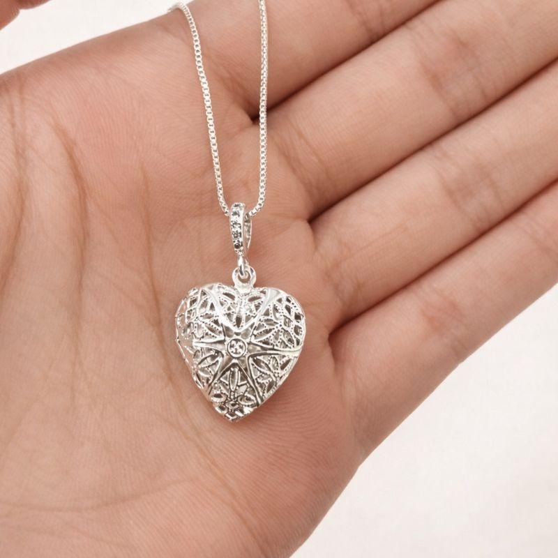RELICÁRIO CORAÇÃO BANHADO A PRATA