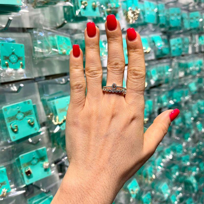 ANEL DUPLO EM ZIRCÔNIA E PONTO DE LUZ BANHADO A PRATA