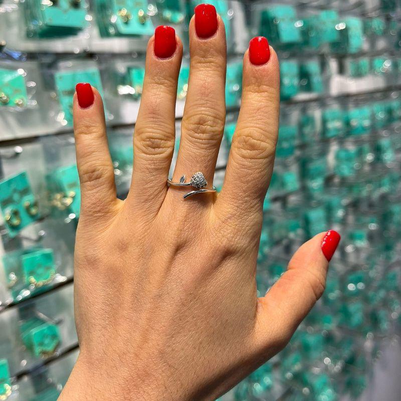 ANEL REGULÁVEL FLOR E CORAÇÃO EM ZIRCÔNIA BANHADO A PRATA