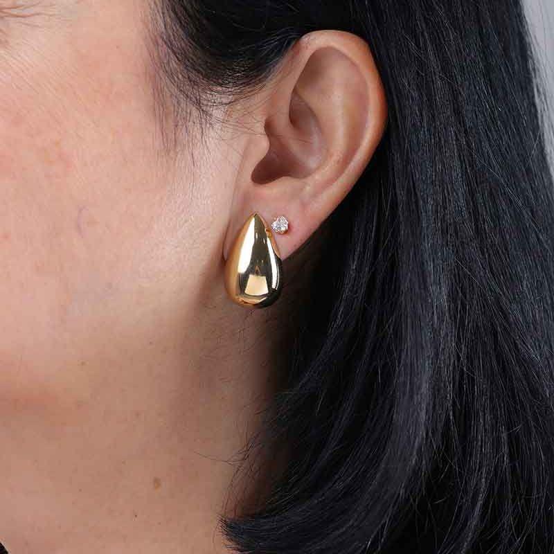 BRINCO GOTA PUFFER BANHADO A OURO