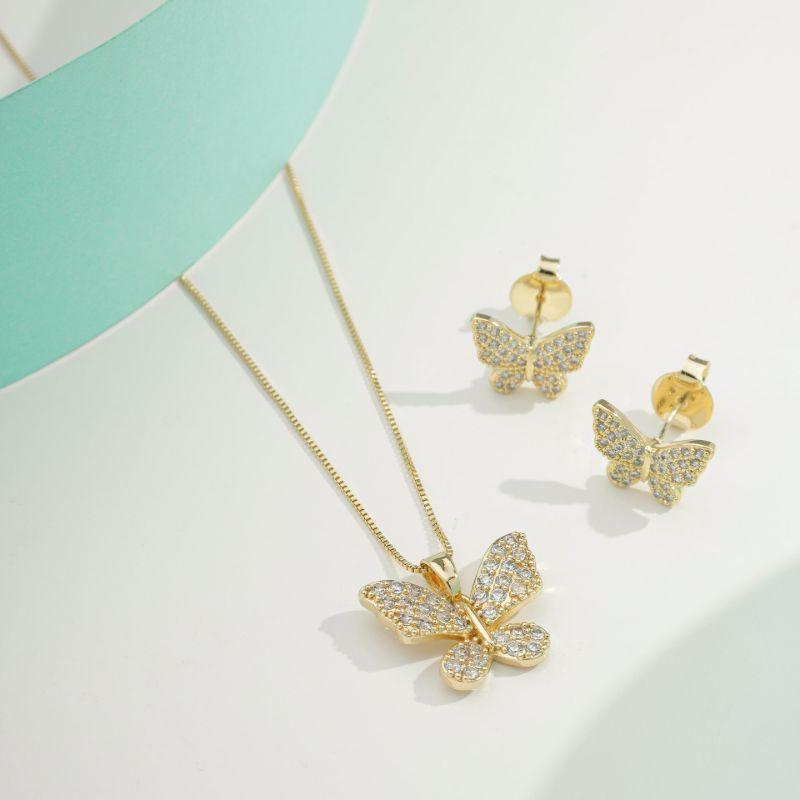 CONJUNTO BORBOLETA EM ZIRCÔNIA BANHADO A OURO