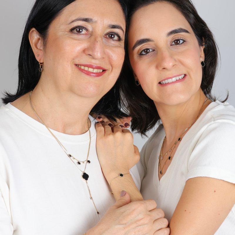 GRAVATINHA TREVO PRETO BANHADO A OURO