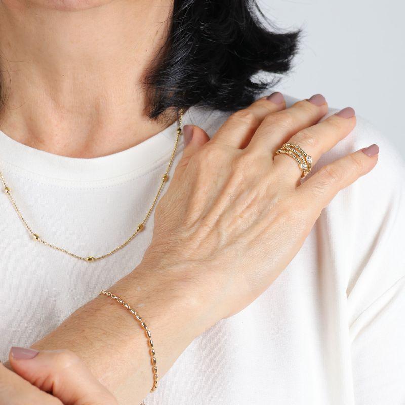 PULSEIRA GRÃO DE ARROZ BANHADO A OURO