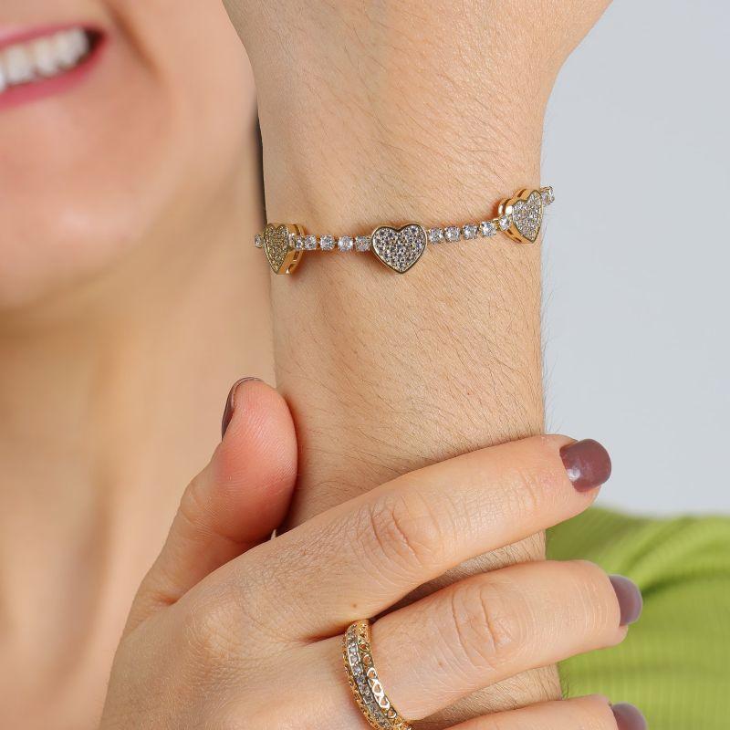 PULSEIRA CORAÇÃO RIVIERA EM ZIRCÔNIA REGULÁVEL BANHADO A OURO