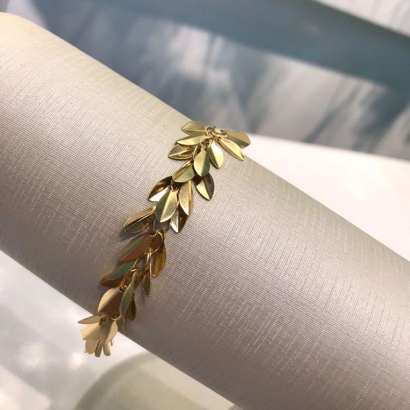 PULSEIRA FOLHAS BANHADO A OURO