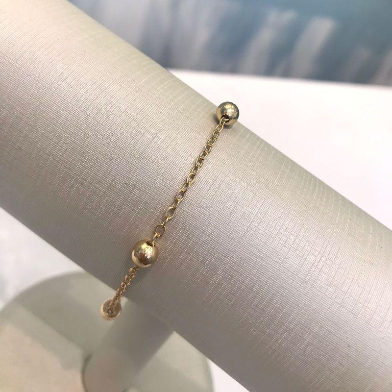PULSEIRA MINI ESFERA BANHADO A OURO