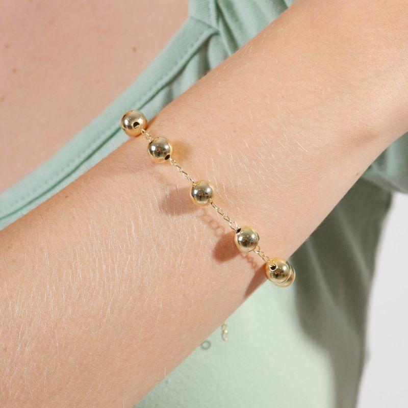 PULSEIRA ESFERAS BANHADO A OURO