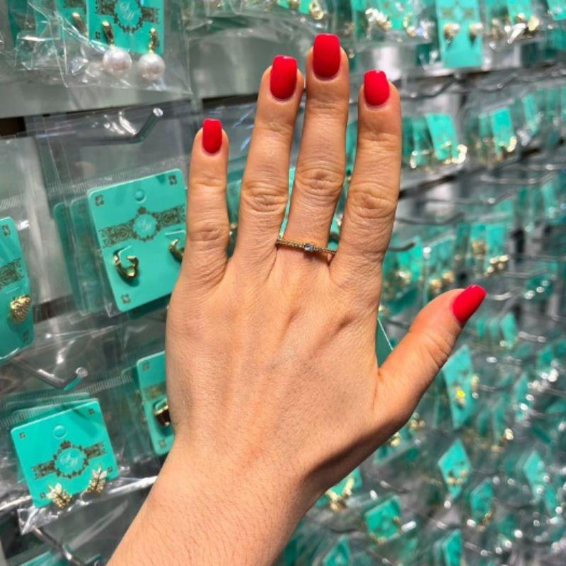 MEIA ALIANÇA COM PONTO DE LUZ BANHADO A OURO