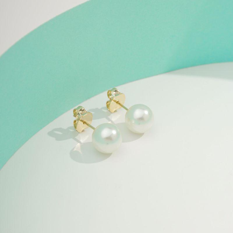 BRINCO DE PÉROLA TAM G BANHADO A OURO