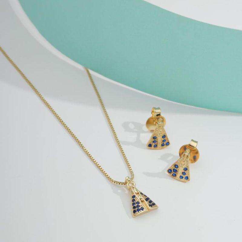 BRINCO NOSSA SRA APARECIDA EM ZIRCÔNIA AZUL BANHADO A OURO