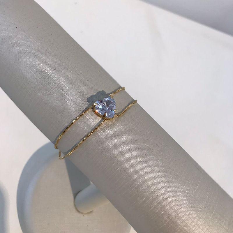 PULSEIRA DUPLA CORAÇÃO RELUZ BANHADO A OURO