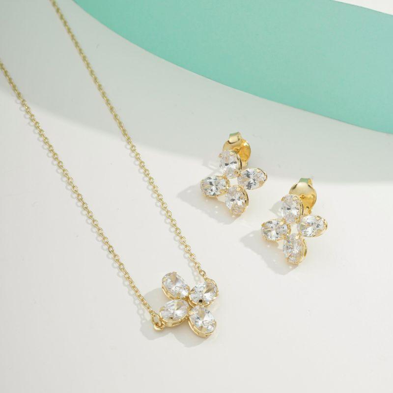 CONJUNTO TREVO ZIRCÔNIA GOLD BANHADO A OURO