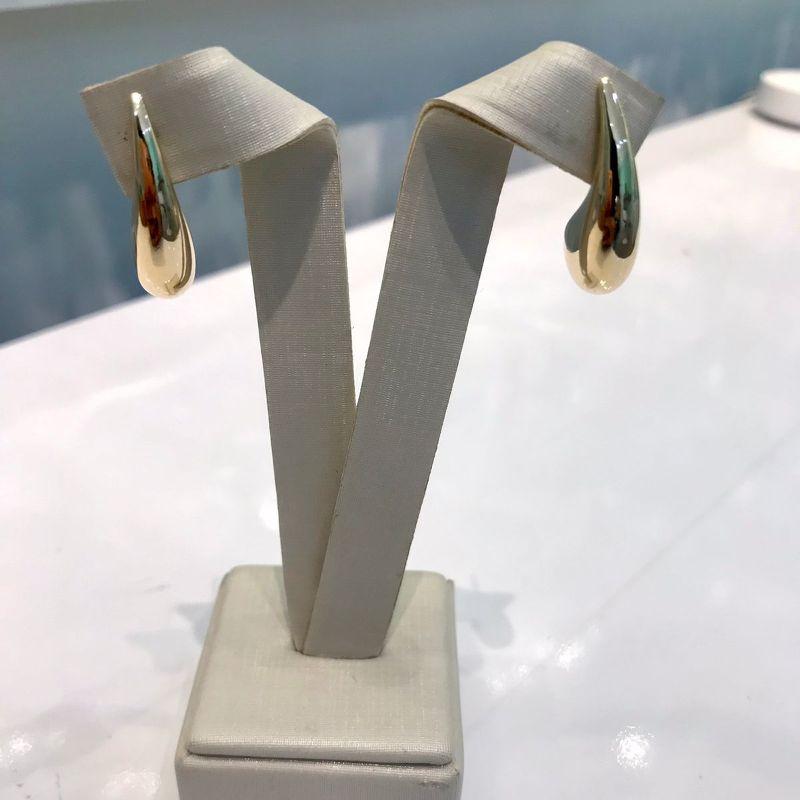 BRINCO GOTA PUFFER BANHADO A OURO