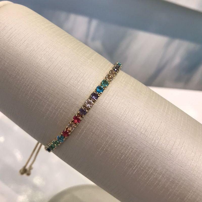 PULSEIRA RIVIERA ZIRCÔNIA COLORIDA REGULÁVEL BANHADO A OURO