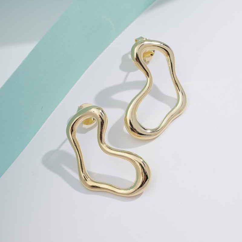 BRINCO ORGÂNICO VENEZA BANHADO A OURO