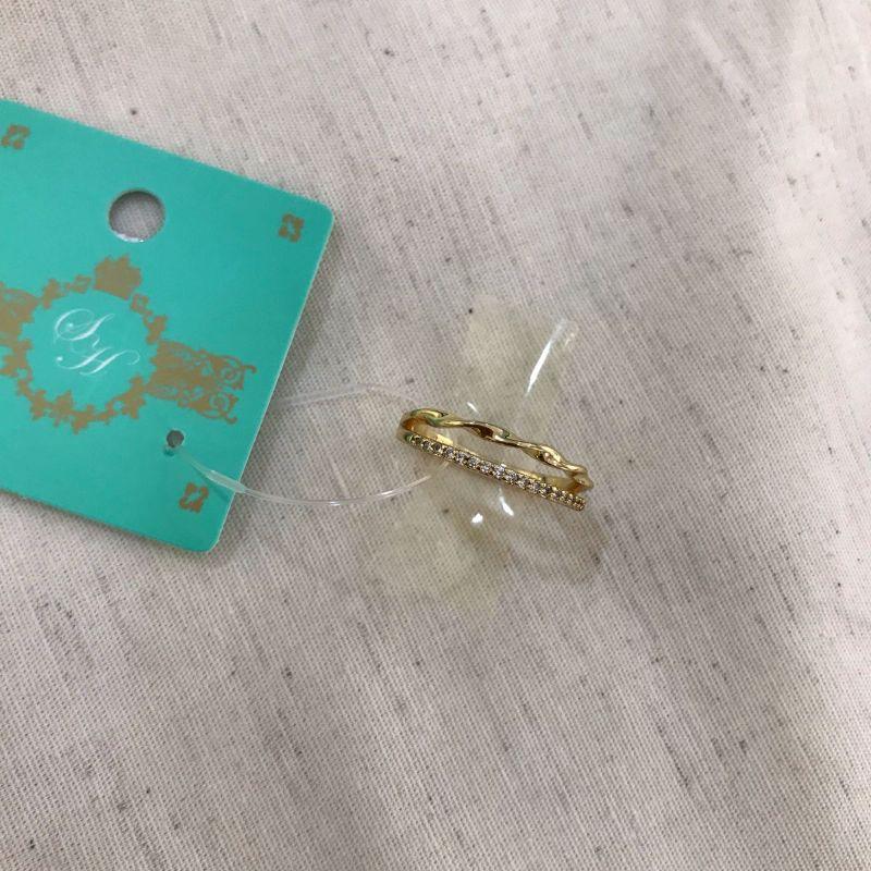 ANEL DUPLO TORCIDO ZIRCÔNIA BANHADO A OURO