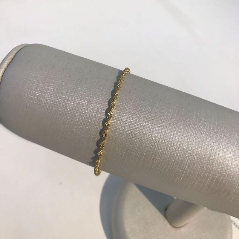 PULSEIRA CORRENTARIA TORCIDA BANHADO A OURO