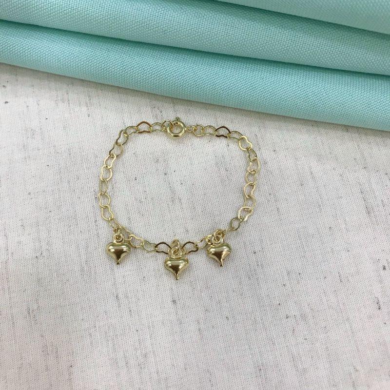PULSEIRA CORAÇÃO VAZADA COM PINGENTES INFANTIL BANHADO A OURO