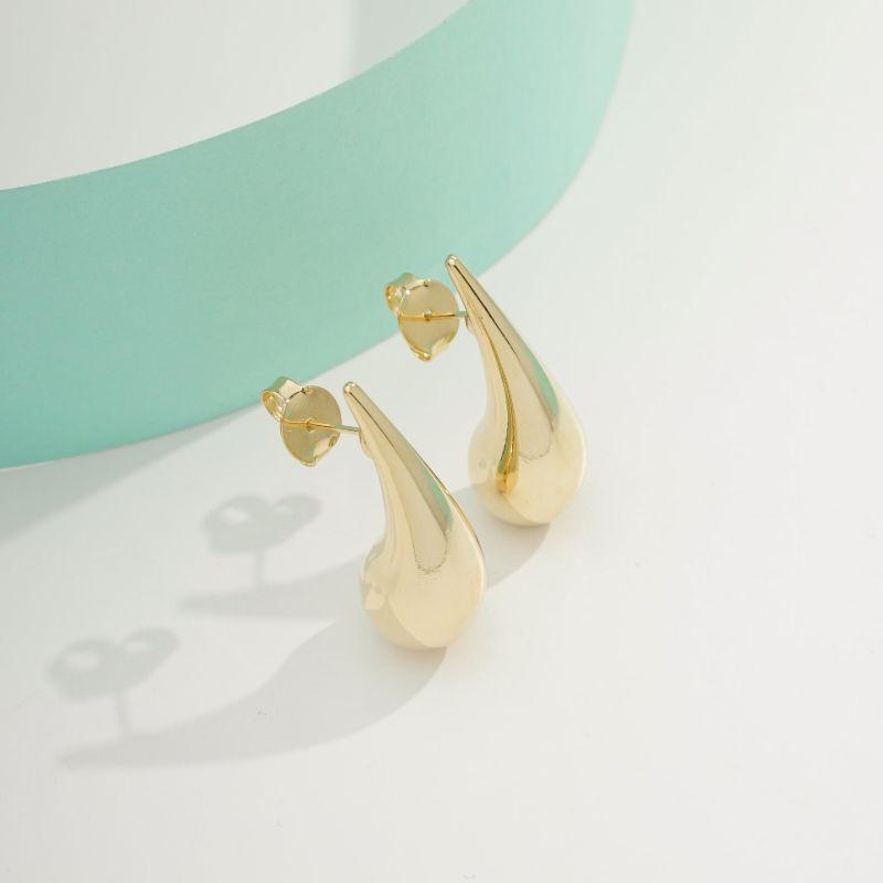 BRINCO GOTA ALONGADA BANHADO A OURO