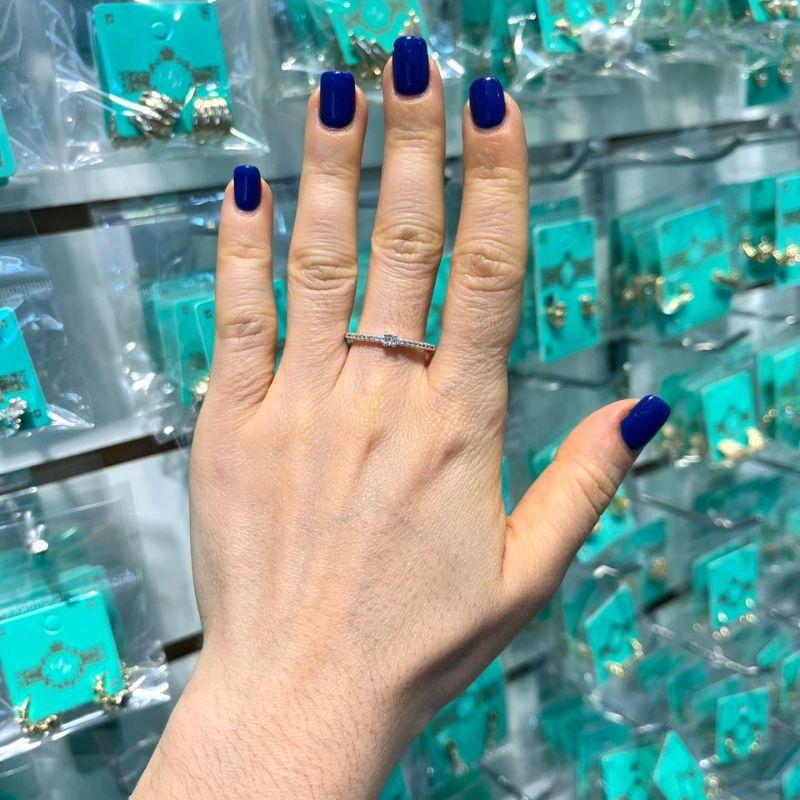 MEIA ALIANÇA COM PONTO DE LUZ BANHADO A PRATA