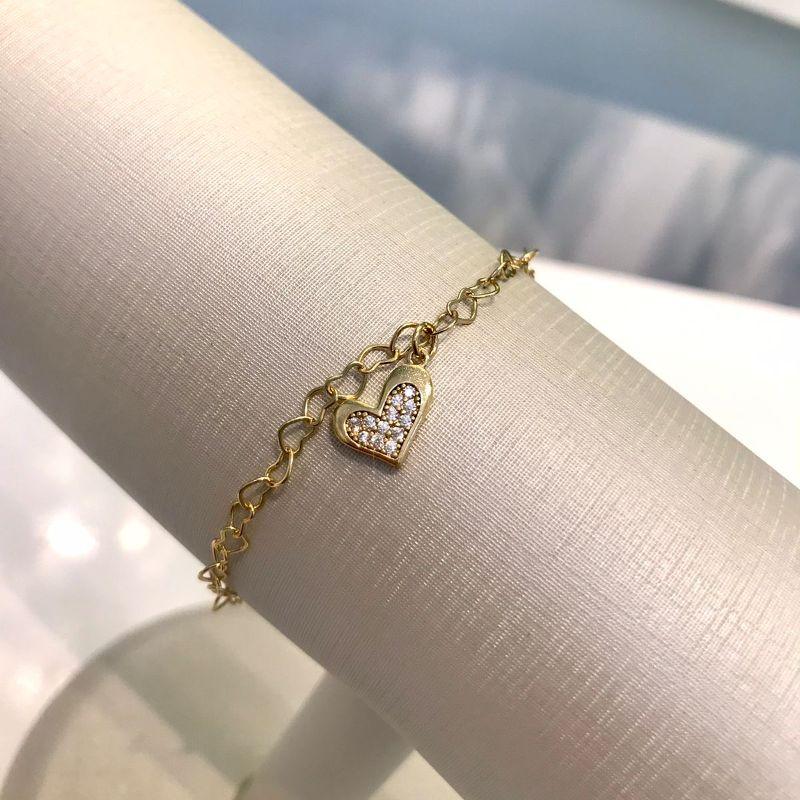 PULSEIRA CORAÇÃO VAZADO ACHATADINHO ZIRCÔNIA BANHADO A OURO