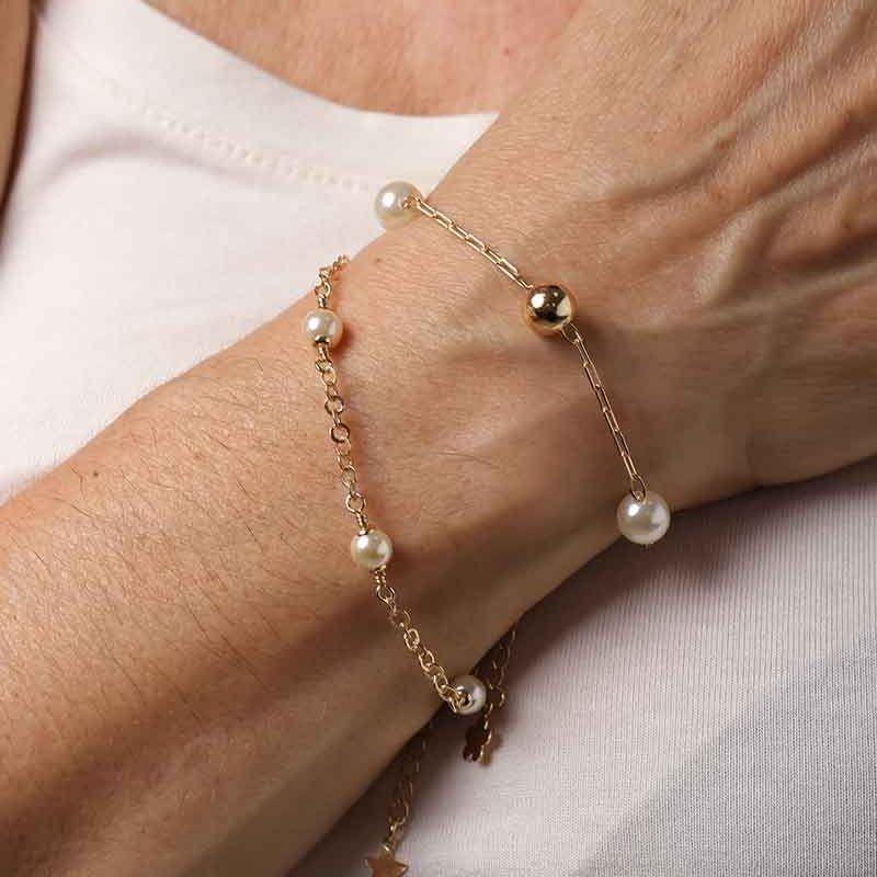 PULSEIRA DE PÉROLAS E ESFERAS BANHADO A OURO