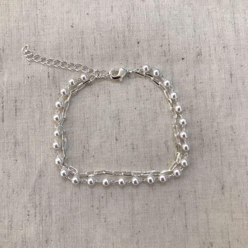 PULSEIRA DUPLA DE PÉROLA E CARTIER BANHADO A PRATA