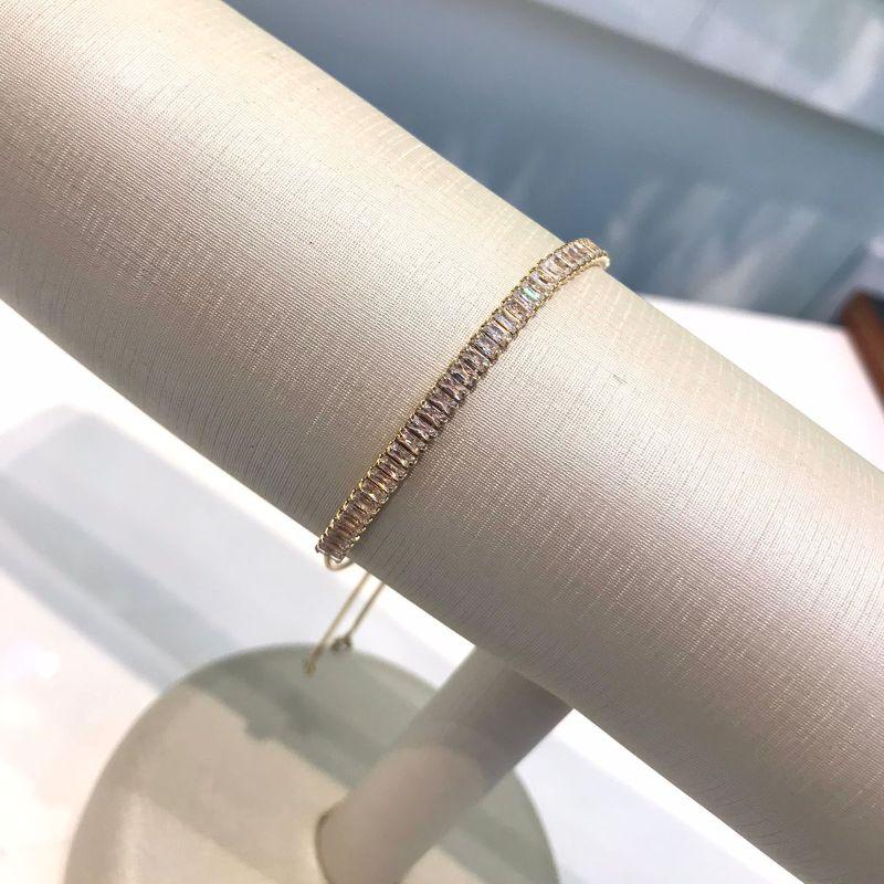 PULSEIRA EM ZIRCÔNIA BAGUETE REGULÁVEL BANHADO A OURO