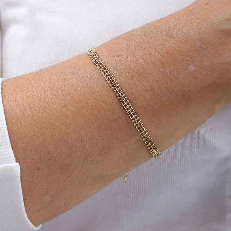PULSEIRA MALHA ESFERA BANHADO A OURO