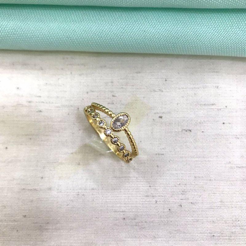 ANEL DUPLO EM ZIRCÔNIA PONTO DE LUZ BANHADO A OURO