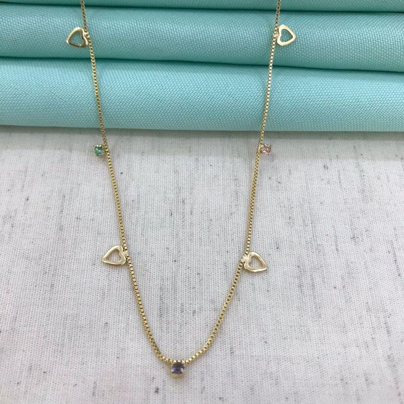 COLAR CORAÇÃO VAZADO PONTO DE LUZ BANHADO A OURO