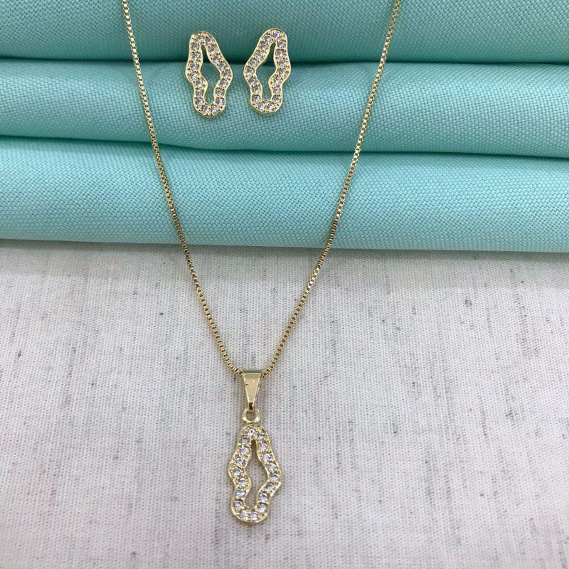 CONJUNTO ORGÂNICO EM ZIRCÔNIA BANHADO A OURO