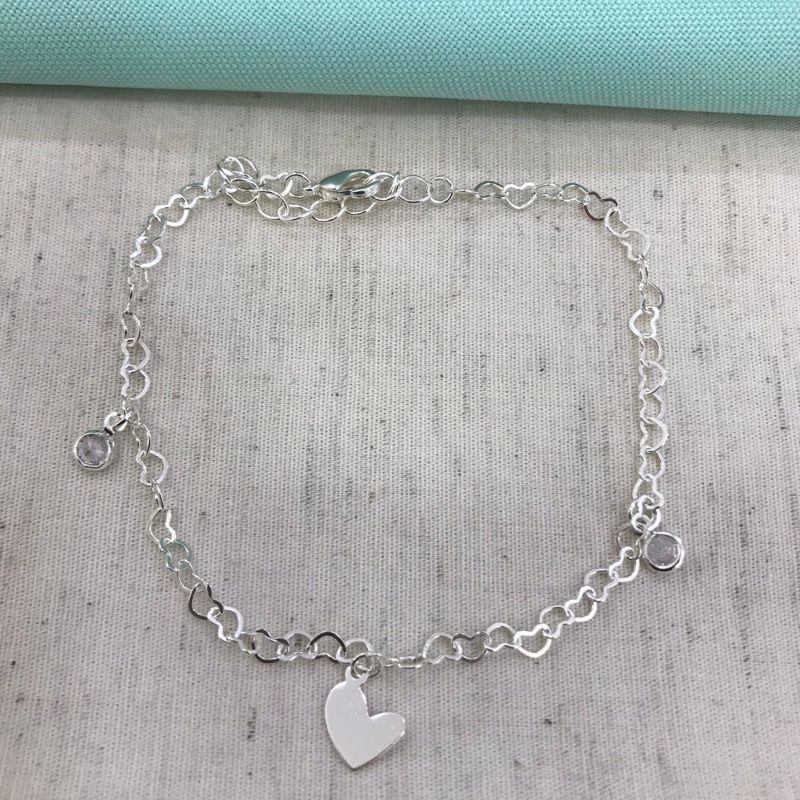 PULSEIRA CORAÇÃO VAZADO PONTO DE LUZ BANHADO A PRATA