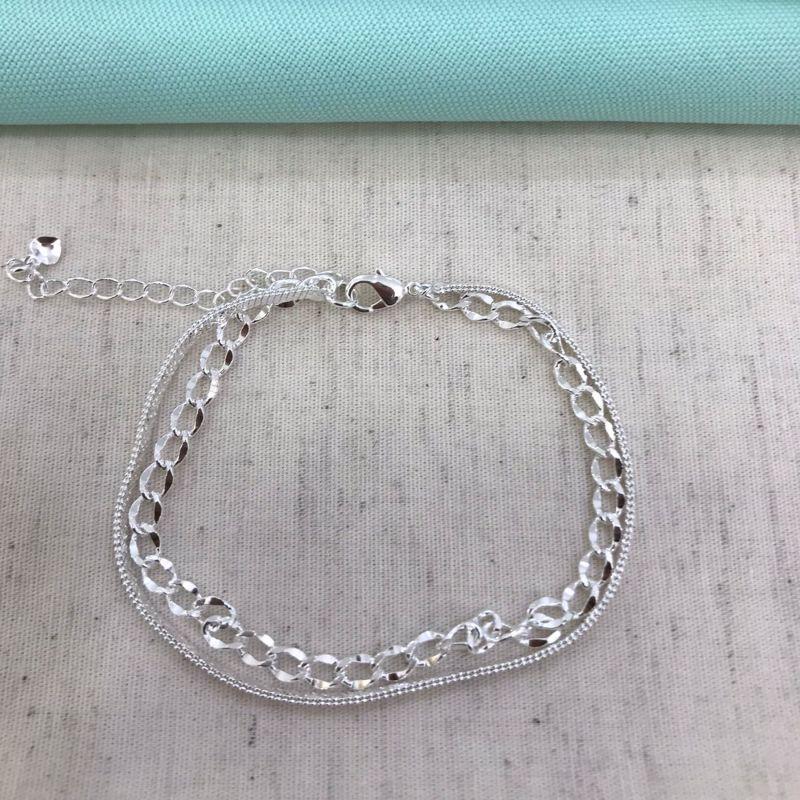 PULSEIRA DUPLA ENTRELAÇOS BANHADO A PRATA