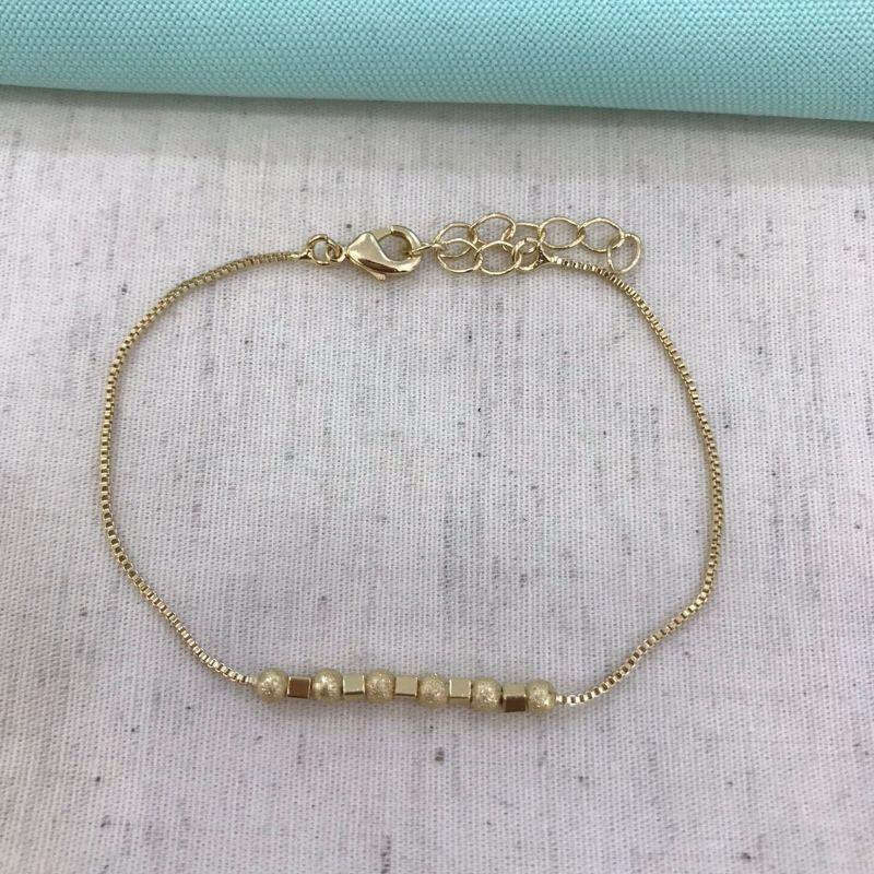 PULSEIRA SQUAD ESFERA FOSCA BANHADO A OURO