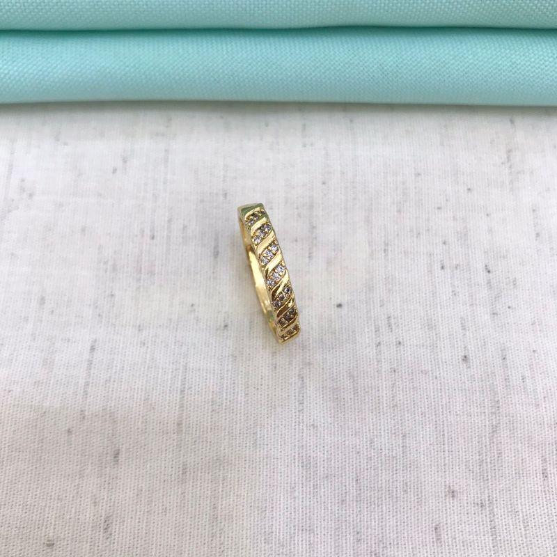 AEL APARADOR EM ZIRCÔNIA BANHADO A OURO